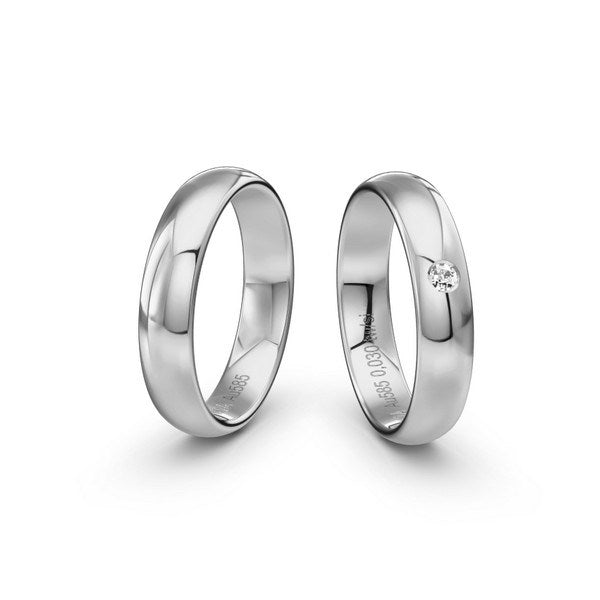 Romantisk Siersbøl vielsesringe i 14 karat hvidguld med blank overflade og 0,03 ct diamant i damering.